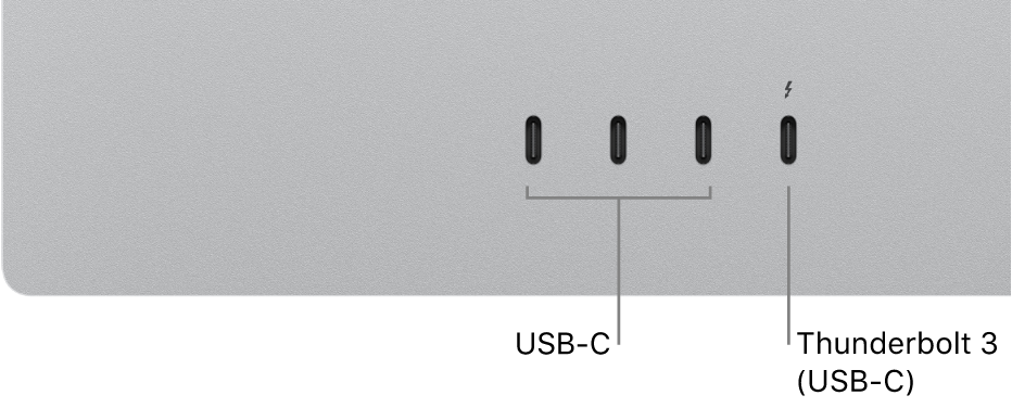 Et nærbilde av baksiden av Studio Display som viser tre USB-C-porter på venstre side og en Thunderbolt 3-port (USB-C) på høyre side.