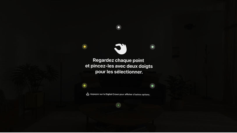 Vue « Configuration du regard », avec des instructions indiquant de regarder chaque point et de les pincer avec deux doigts pour les sélectionner. Des instructions sont également présentes pour appuyer sur la Digital Crown afin d’obtenir des options supplémentaires.