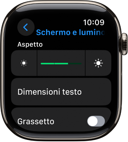 Le impostazioni “Schermo e luminosità” su Apple Watch, con l’interruttore della luminosità in alto e il pulsante “Dimensioni testo” in basso.