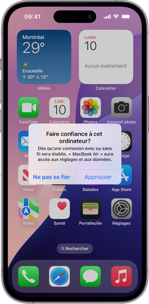 Un iPad qui affiche la boîte de dialogue « Faire confiance à cet ordinateur? » lorsqu’il est connecté à un MacBook Air pour la première fois.