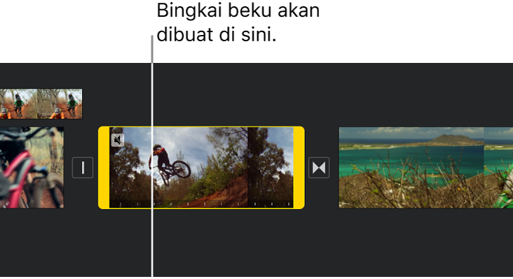 Klip video di garis waktu dengan pengendali cakupan kuning di tiap ujung, dan playhead diposisikan di tempat bingkai beku akan ditambahkan.