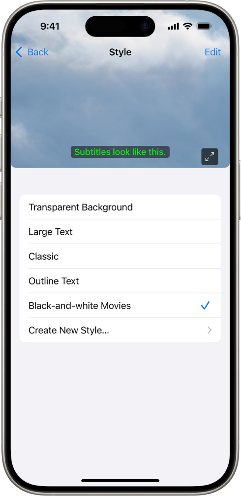An iPhone showing an example of subtitles with a custom style.