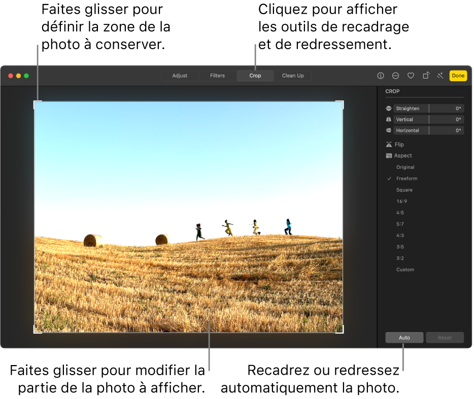 Une photo en mode édition, avec l’outil Recadrer sélectionné dans la barre d’outils, un rectangle de sélection autour de la photo, ainsi que des curseurs de redressement, des options de proportions, et des boutons Auto et Réinitialiser à droite.