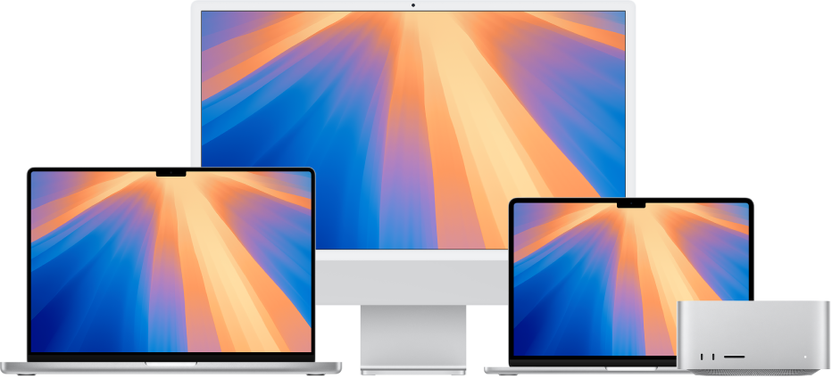 Слева направо: MacBook Pro, iMac и MacBook Air с разноцветными рабочими столами. Mac Studio находится справа.