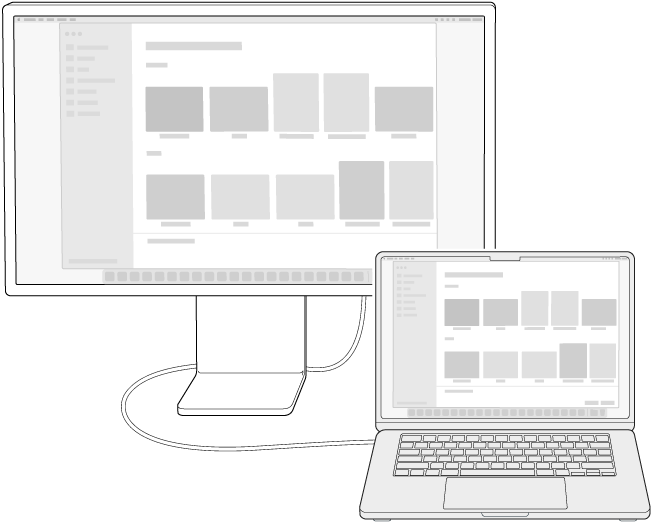 顯示器連接到 MacBook Air，在兩個螢幕之間呈現鏡像輸出的桌面。