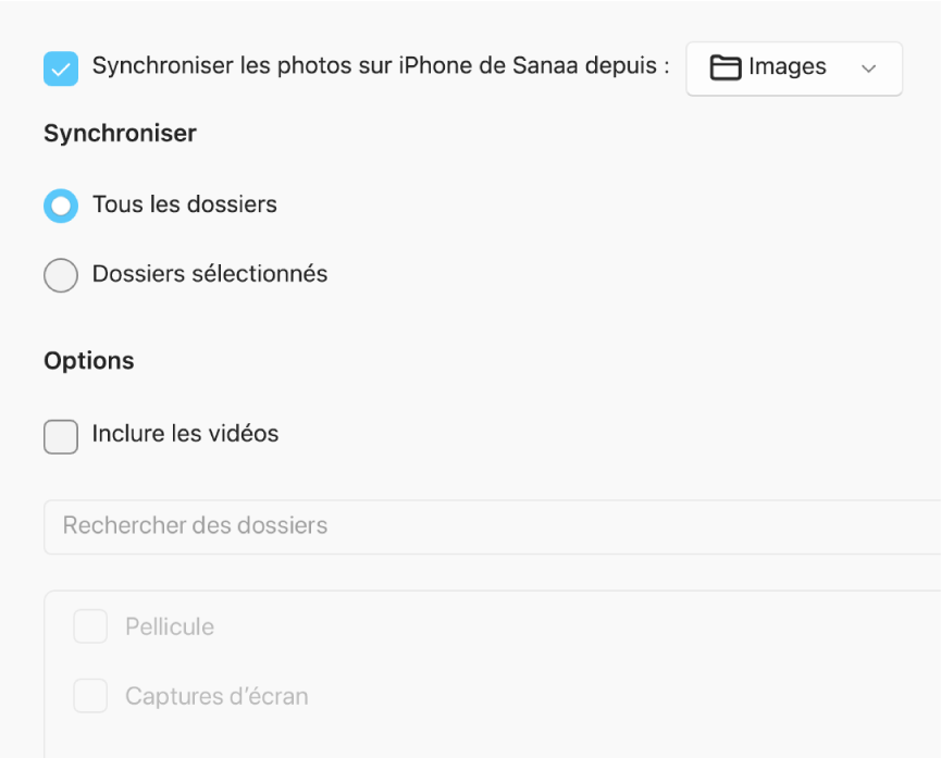 Les boutons radio « Tous les albums et photos » et « Albums sélectionnés » s’affichent avec les cases à cocher « Seulement les favoris », « Inclure les vidéos » et « Inclure automatiquement les photos de » ci-dessous.
