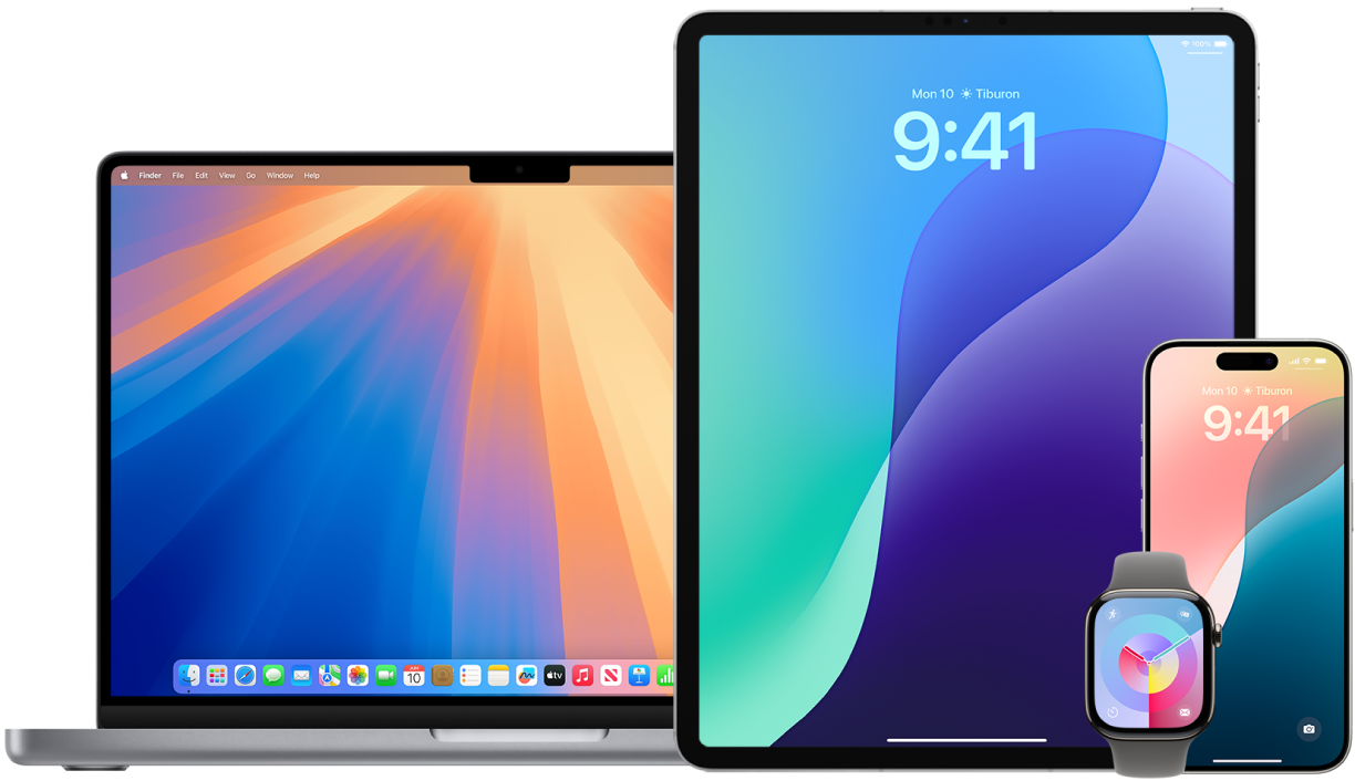 A MacBook Pro, iPad, iPhone, and Apple Watch