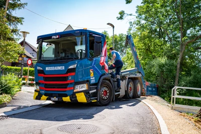 Peter Nussbaumer Transporte AG - Welaki mit Mulde Basel, Schweiz, https://www.nussbaumer-transporte.ch/ Kran, Trasporte, Mulden, Gleistransporte