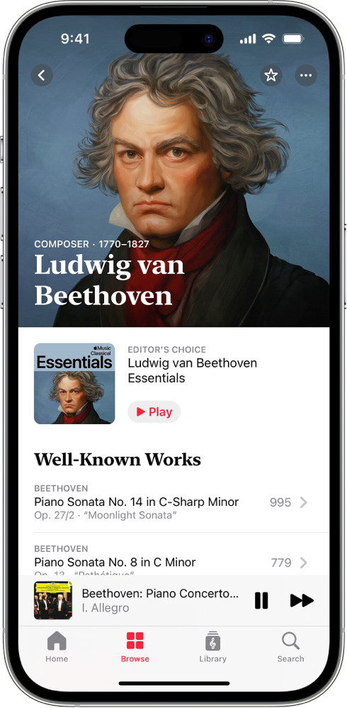 Un iPhone présentant la page du compositeur Ludwig van Beethoven dans Apple Music Classical. L’écran affiche son portrait, une sélection de symphonies spécifiques choisies par la rédaction, ainsi qu’une section Œuvres populaires. En dessous se trouve le mini-lecteur, présentant la piste en cours de lecture. Tout en bas de l’écran figurent les boutons Accueil, Explorer, Bibliothèque et Rechercher.