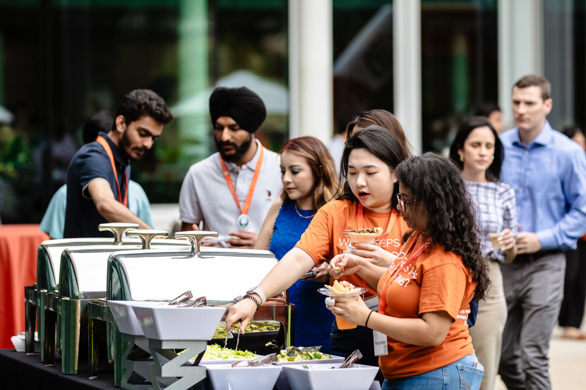 Students walking down the line while getting food