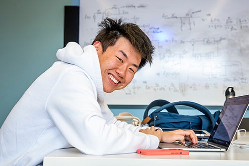 A student works on a computer