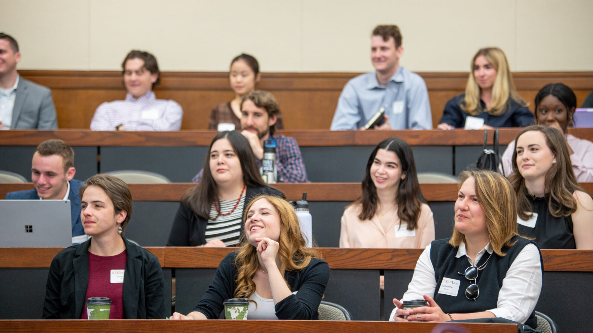 A group of students in a lecture hall.