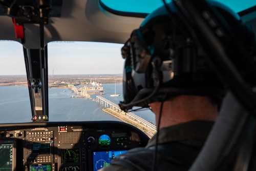 Natural Resources Police conducts an aerial patrol above the Key Bridge collapse site.