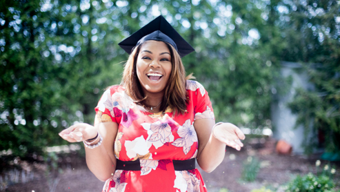 Woman with graduation cap