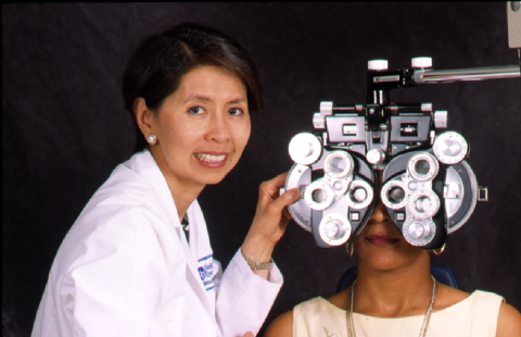 image tagged with provider, eye exam, clinic, lenses, lab coat, …;