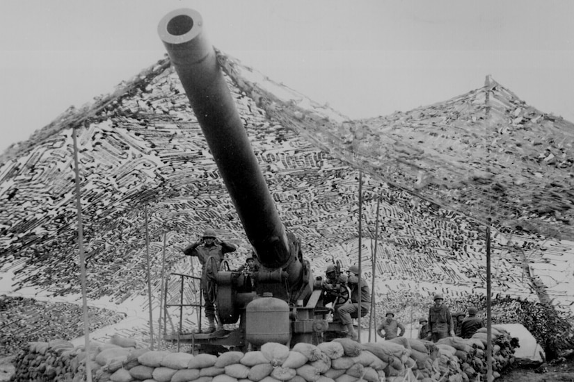 A large gun prepares to fire.