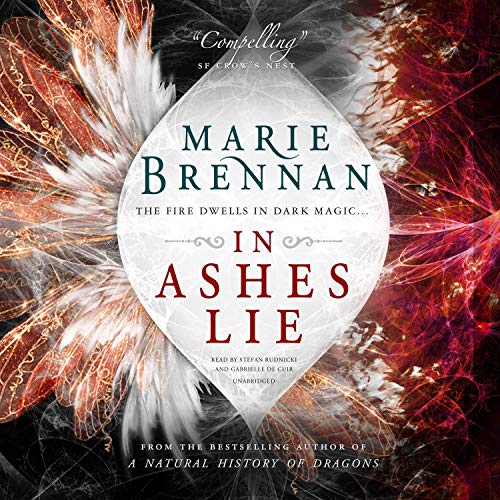 In Ashes Lie Audiolibro Por Marie Brennan arte de portada