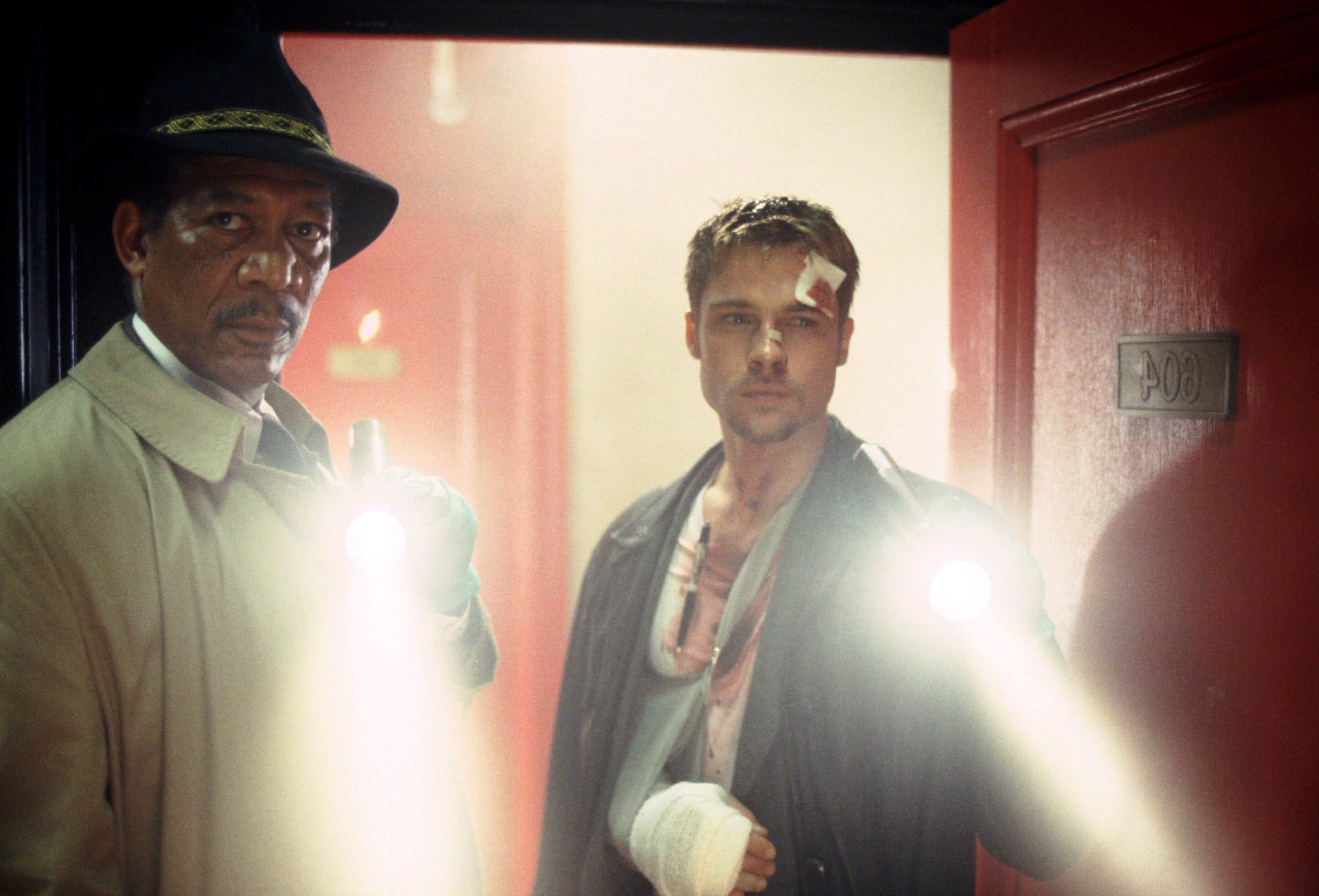 Brad Pitt and Morgan Freeman in Se7en (1995)