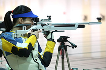 Image of Woman Shooting Air Rifle in Competition