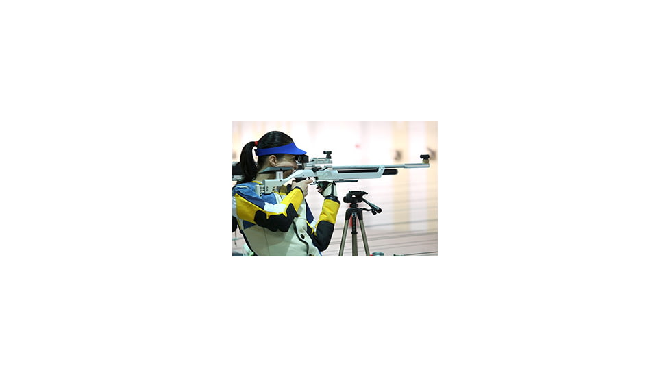 Woman Shooting Air Rifle in Competition