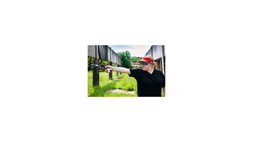 Woman Participating in Pistol Competition