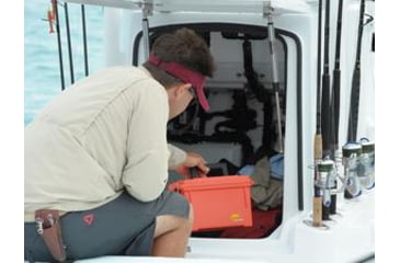 Image of Man Loading Tackle Box into Boat