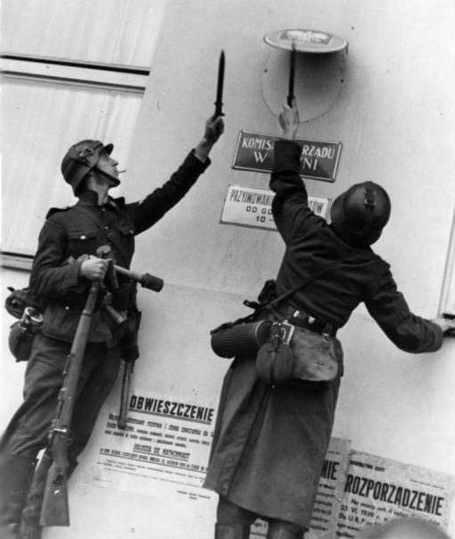 German soldiers consistently tore down Polish government insignias.