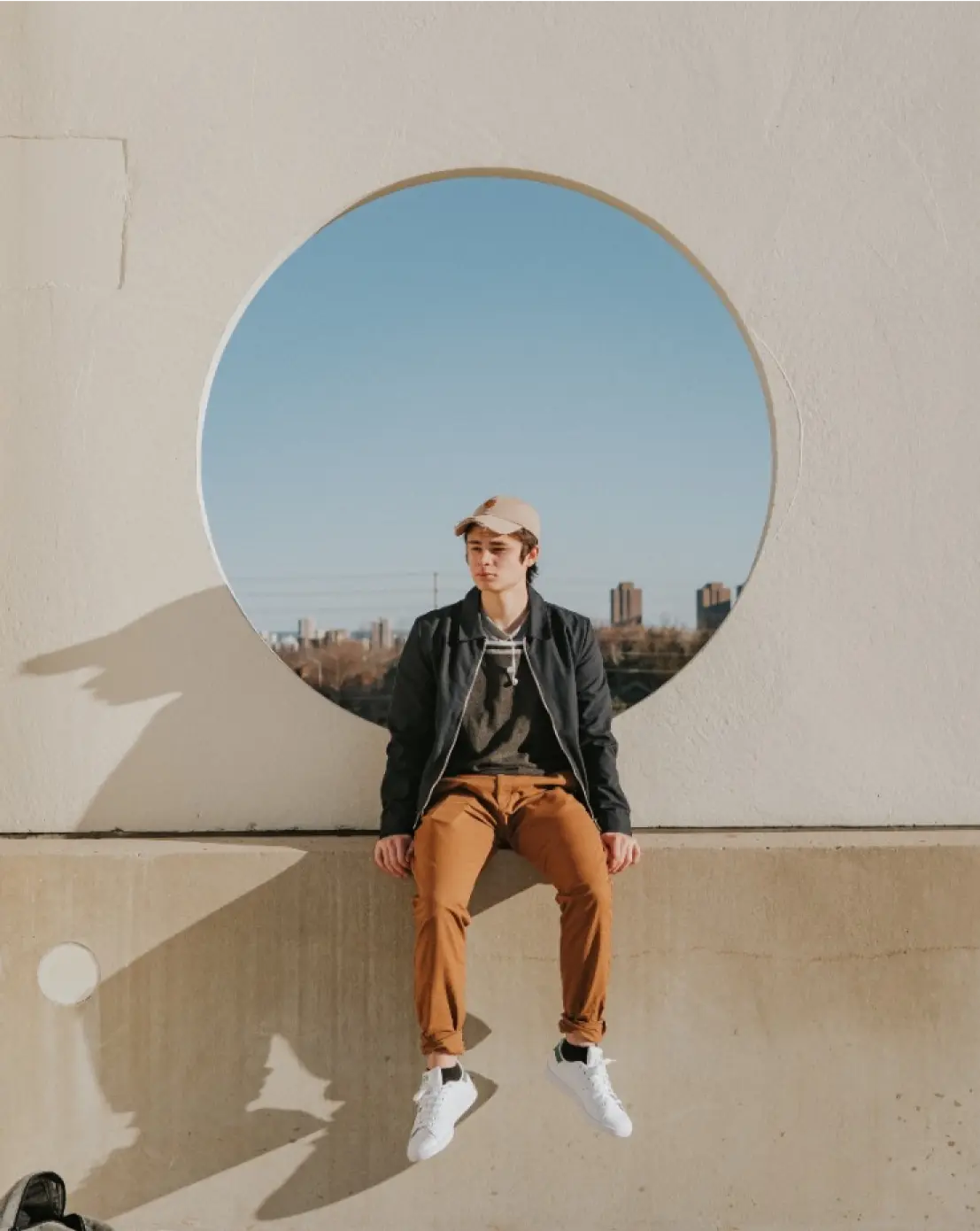 Image of a man sitting down