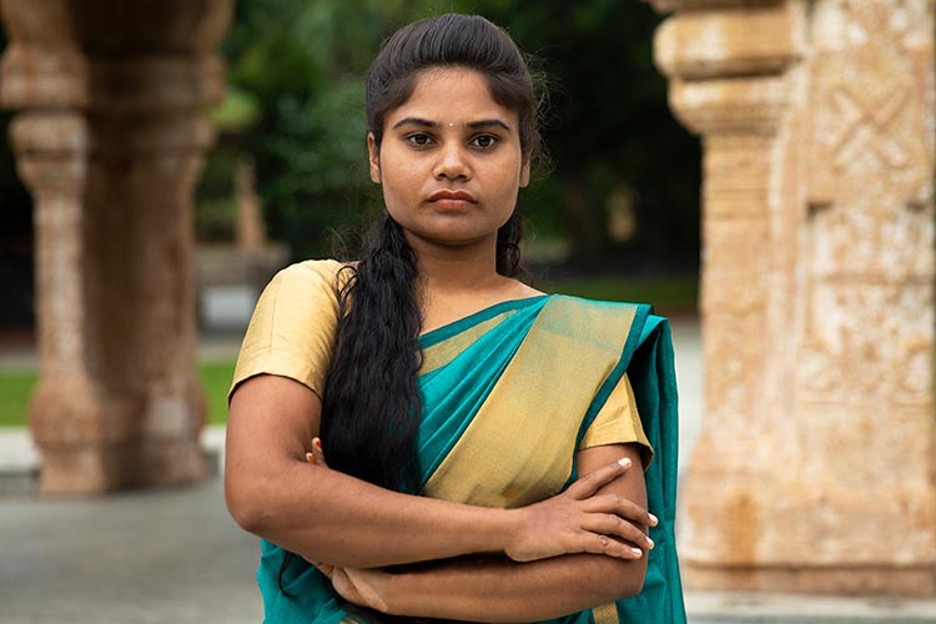 Girl with crossed arms