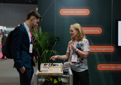 Two visitors to the show having a business conversation