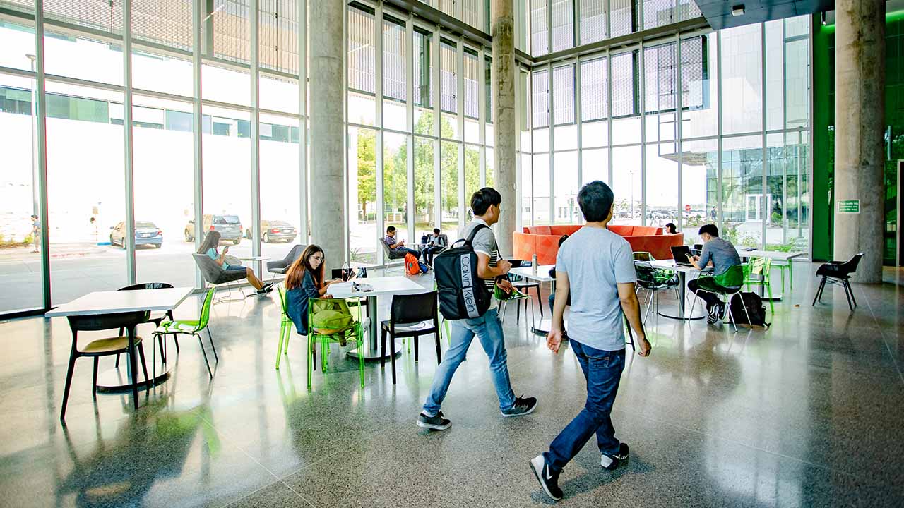 Students walking inside ECSW