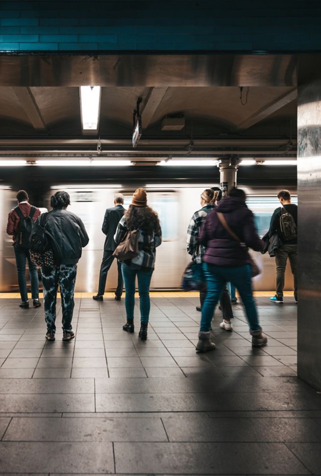 People waiting in a subway station