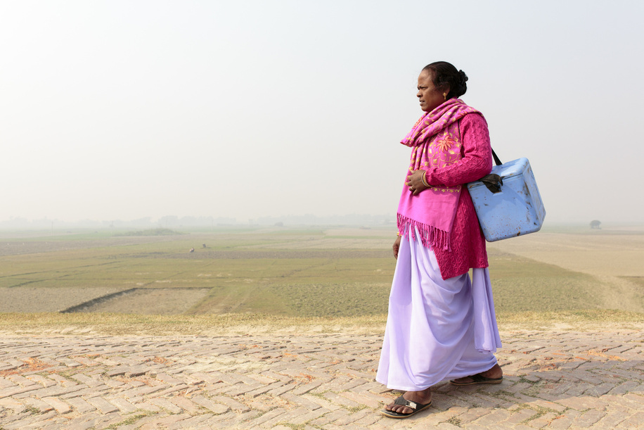 Martha Dodray is a health worker in the Kosi River Basin area of Bihar. In order to protect all children against polio, Martha has walked, waded, boated, and rode on motorcycles to reach the communities living spread throughout the area. The region was one of the last to have polio transmission in India, which was certified polio-free in 2014. Kosi River Basin area near Darbhanga, Bihar State, India. November 2017.