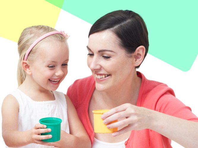 A parent drinks water with their child