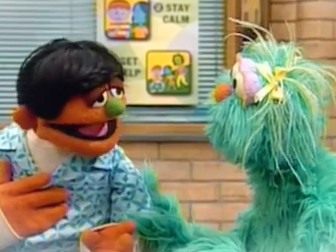 Rosita talks to a Muppet