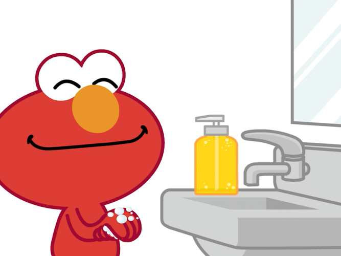 Elmo washing his hands.