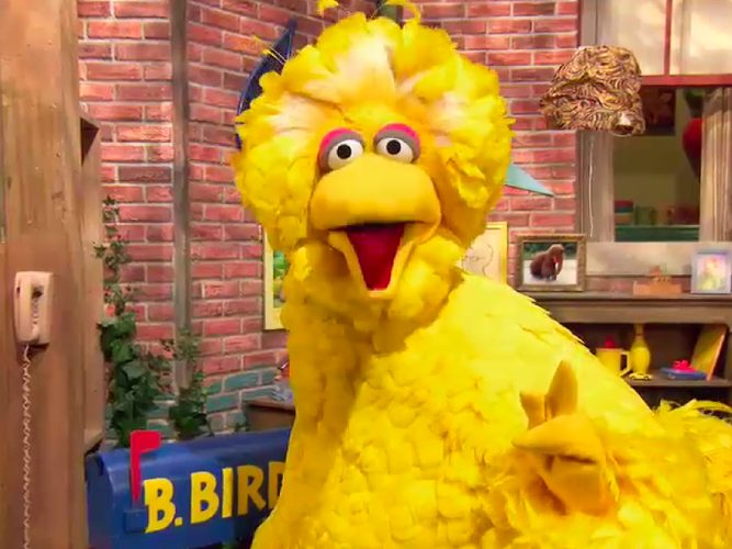 Big Bird smiling by his mailbox