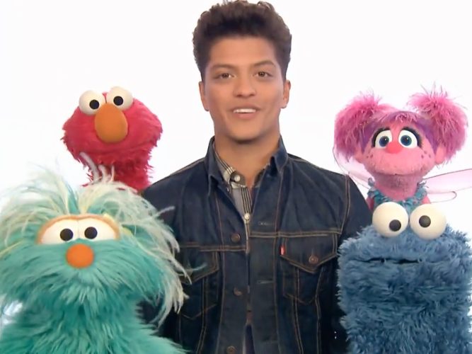 Bruno mars with Rosita, Elmo, Abby and Cookie Monster.