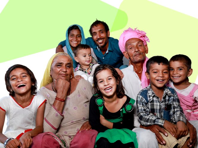 A large extended family smiling together.