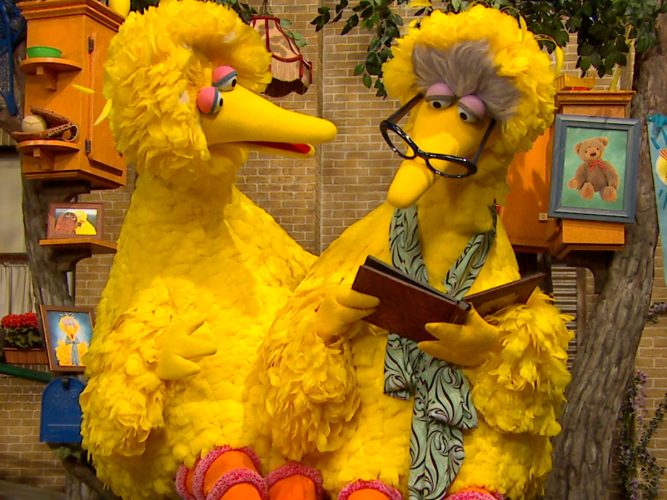 Granny Bird reading to Big Bird in his nest.