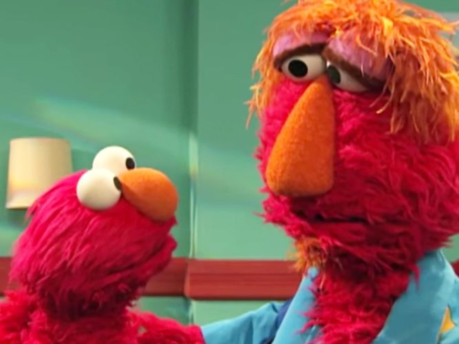 Elmo talks to Louie