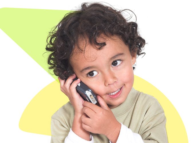 A child speaks on a cellphone