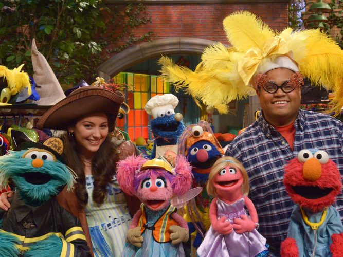 The cast of Sesame Street play dress-up