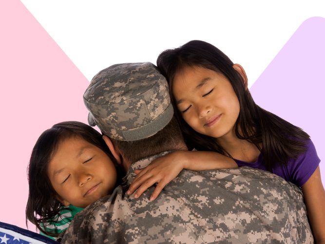 A military parent hugs their children