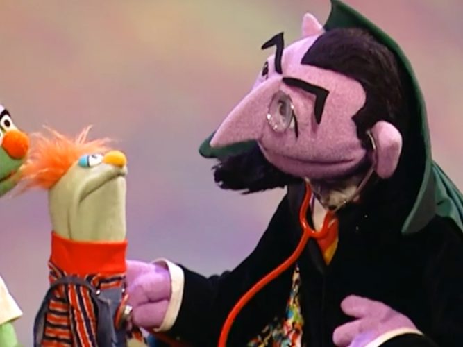 The Count checking a friends heartbeat.