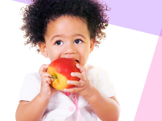 A child eating an apple.