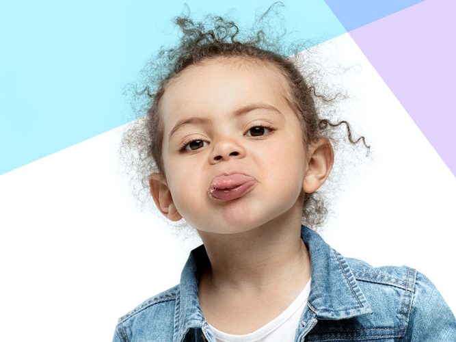 A child sticking out their tongue