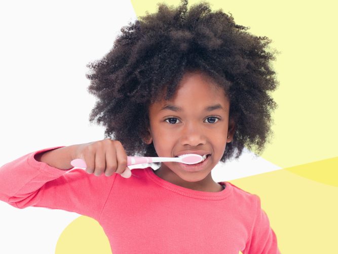 A child brushing their teeth.