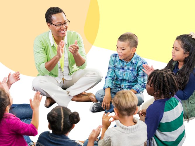 A teacher sitting in a circle with their students.