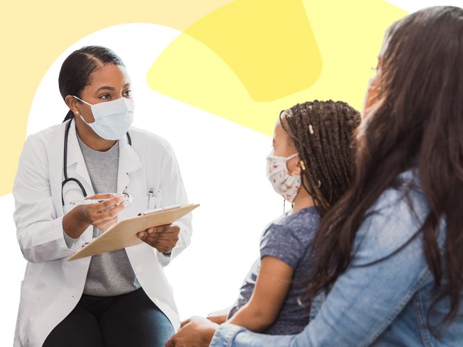 A doctor talking to a parent and child.